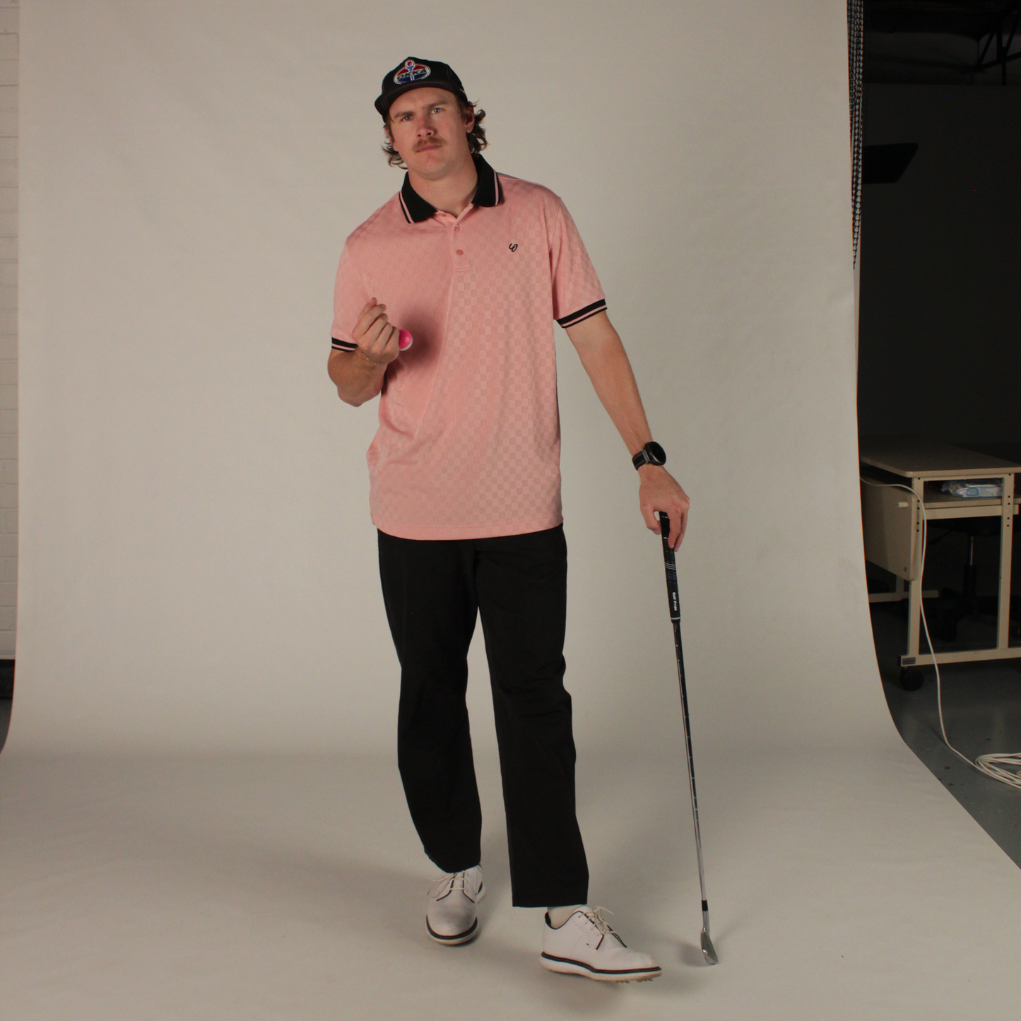checkered pink polo